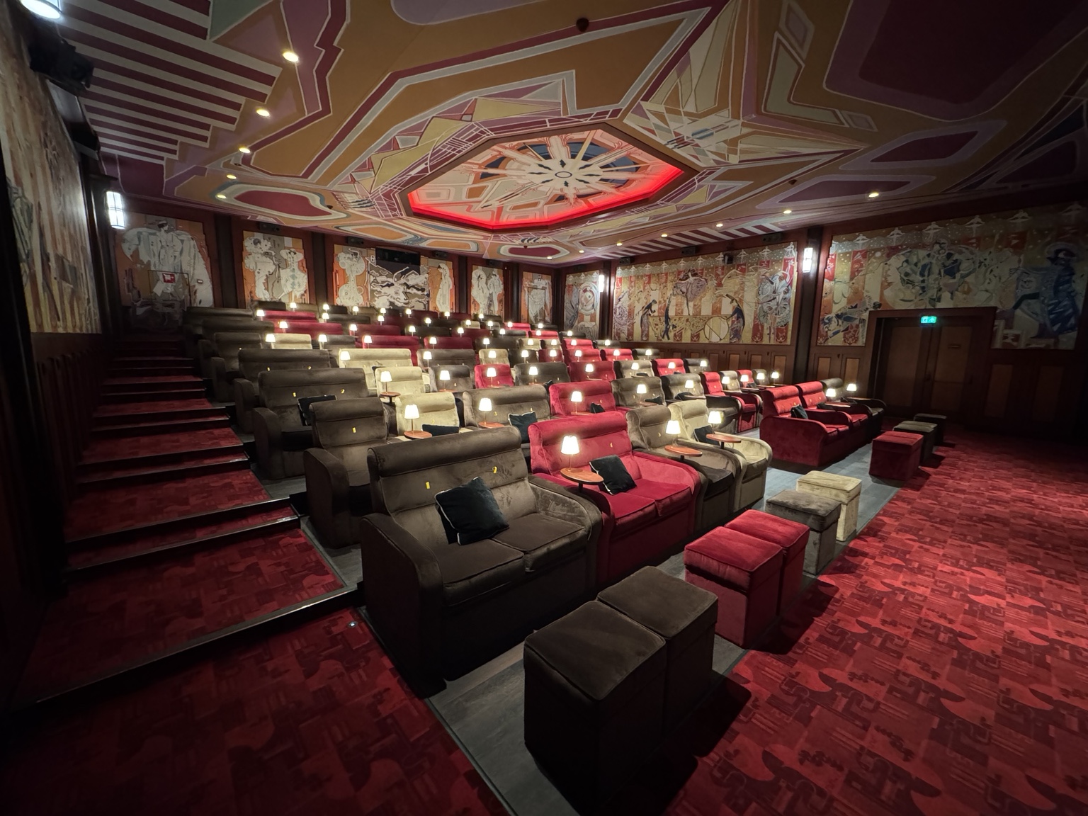 Art Deco seating and illuminated ceiling in Room 2 at Pathé Tuschinski.